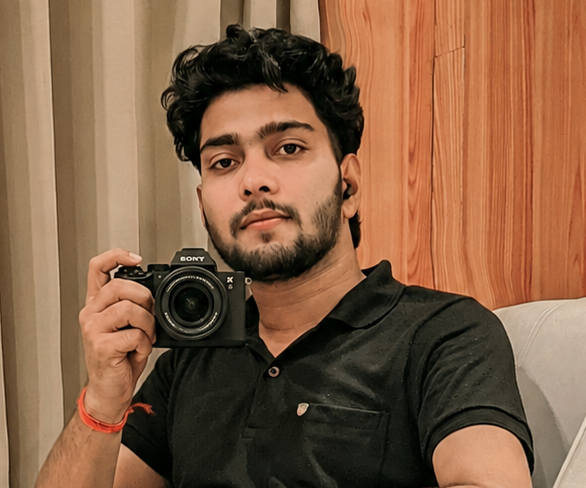 Himadri Singha Mahapatra holding camera